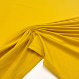 Yellow Cotton Jersey fabric, available now on en.tessuti.fr