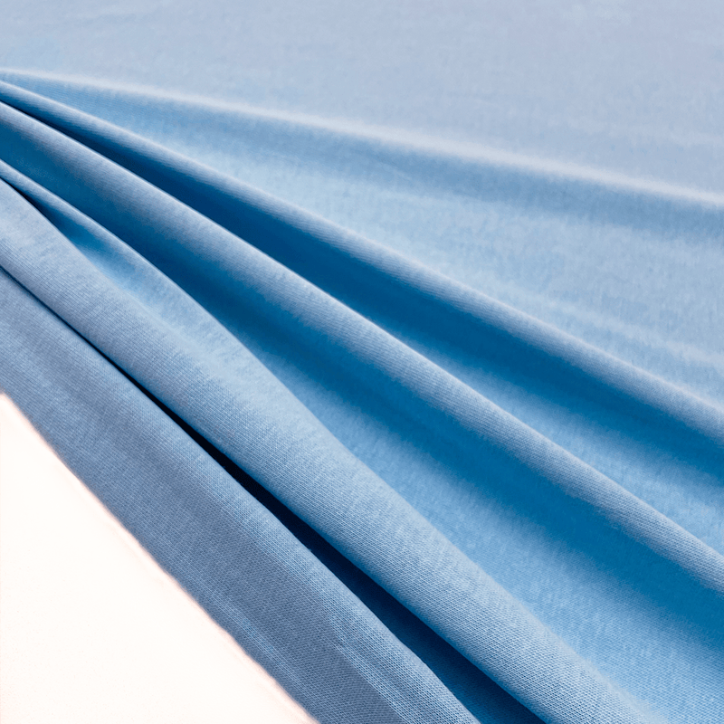 Blue sky Jersey Cotton fabric made in Italy, shop now on en.tessuti.fr