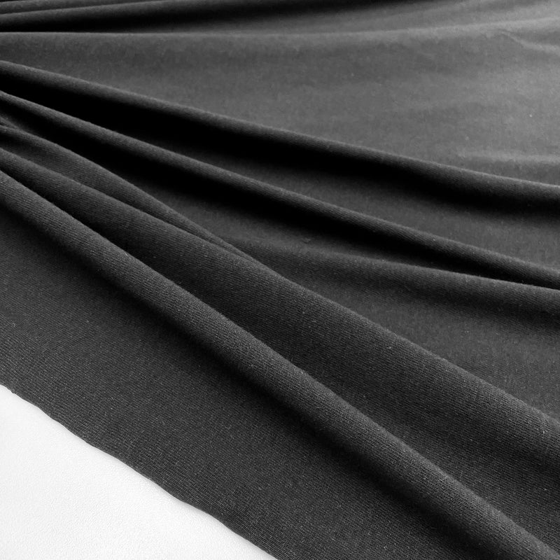 Black Jersey Cotton fabric, shop now on en.tessuti.fr