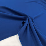 Fabric Crepe Blue Made In Italy, to find on en.tessuti.fr
