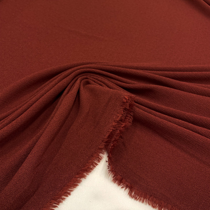 Fabric Crepe of Red Polyester Made in Italy, to find on en.tessuti.fr