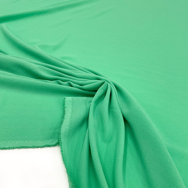 Fabric Crepe Green, to find now on en.tessuti.fr