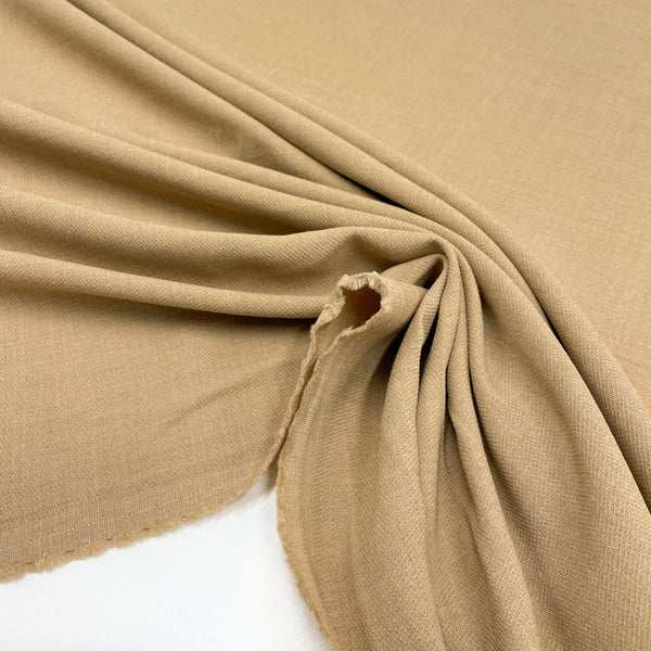 Fabric Crepe of Viscose Beige, to be found on en.tessuti.fr