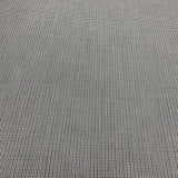 Polyester and wool plaid fabric made in Italy, to be found on en.tessuti.fr