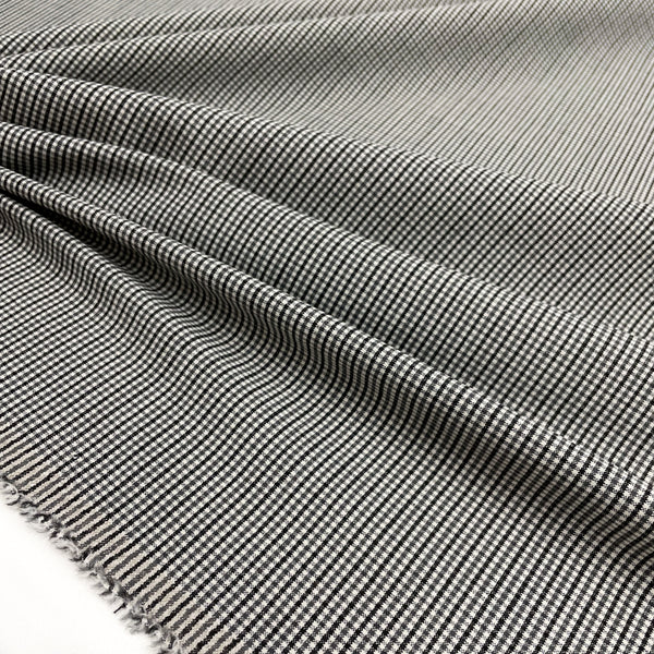 Polyester and wool plaid fabric, to be found now on en.tessuti.fr