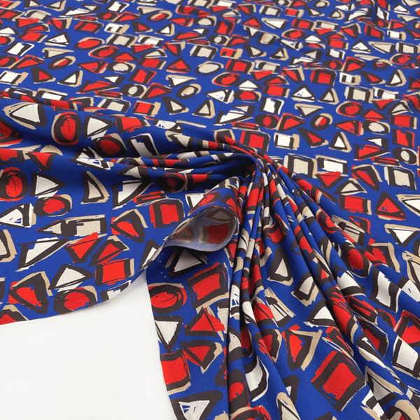 Twill Polyester fabric with geometric pattern, order now on en.tessuti.fr